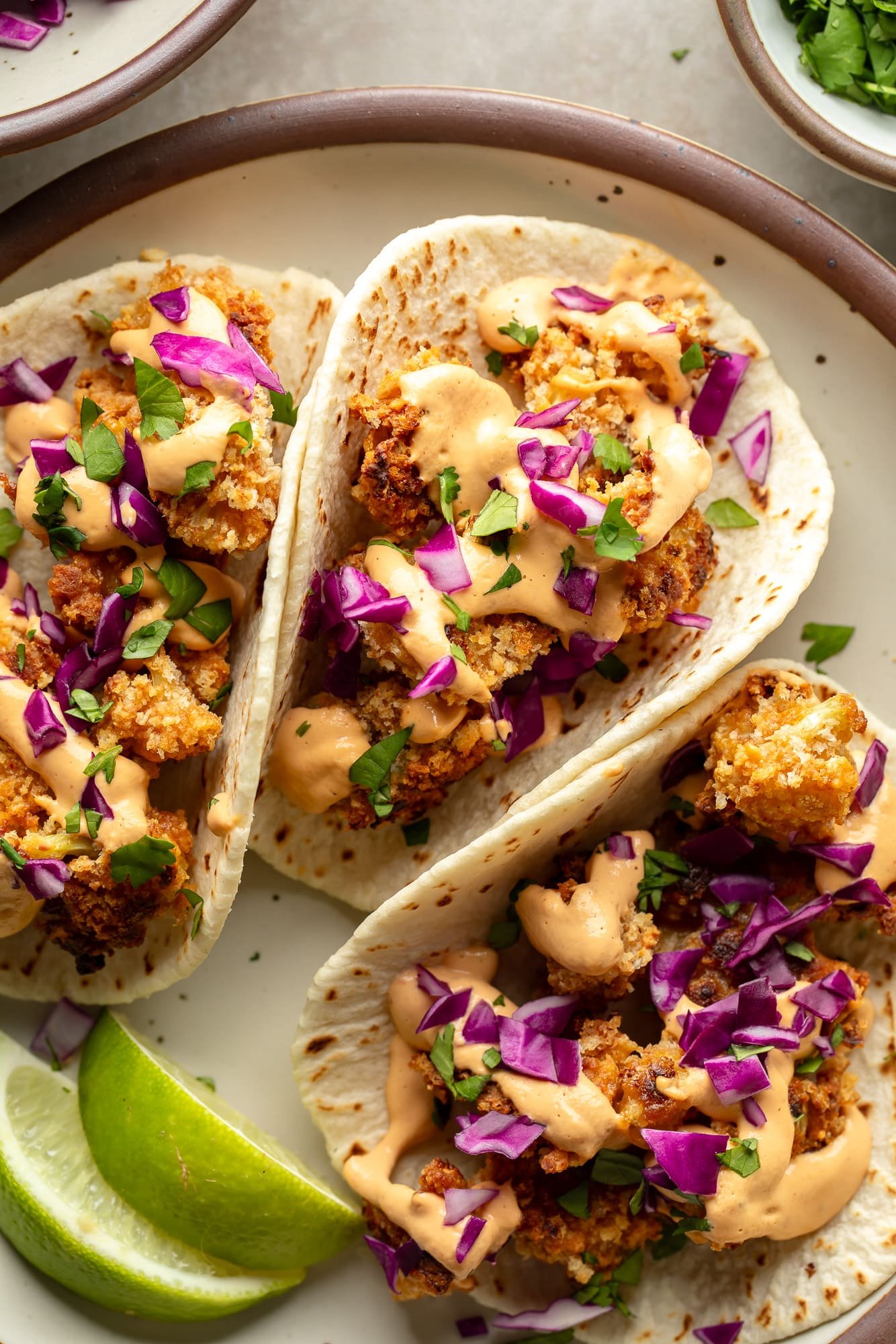 First in 3 crunchy cauliflower studs on a plate.