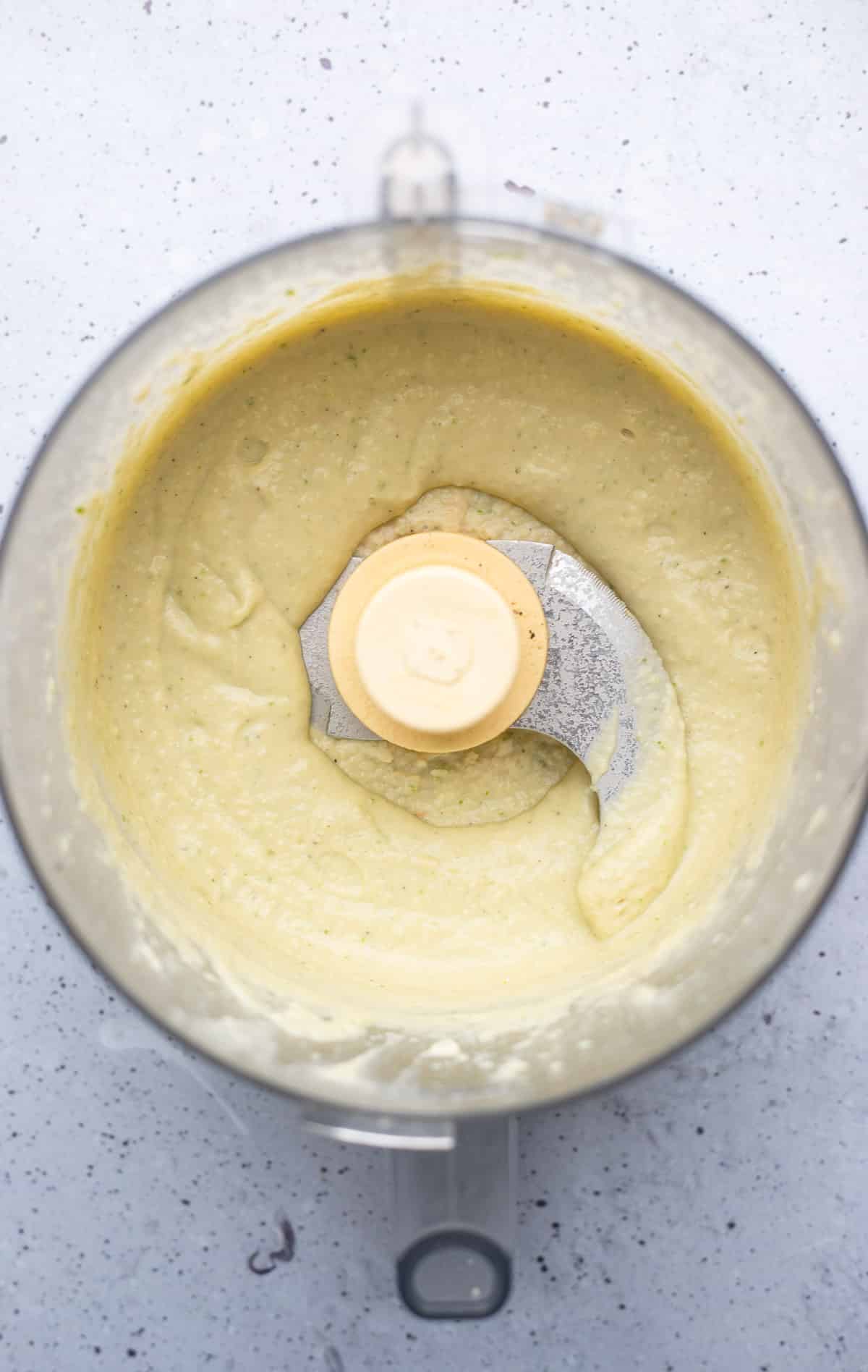 The white beans were mixed in a food processor.