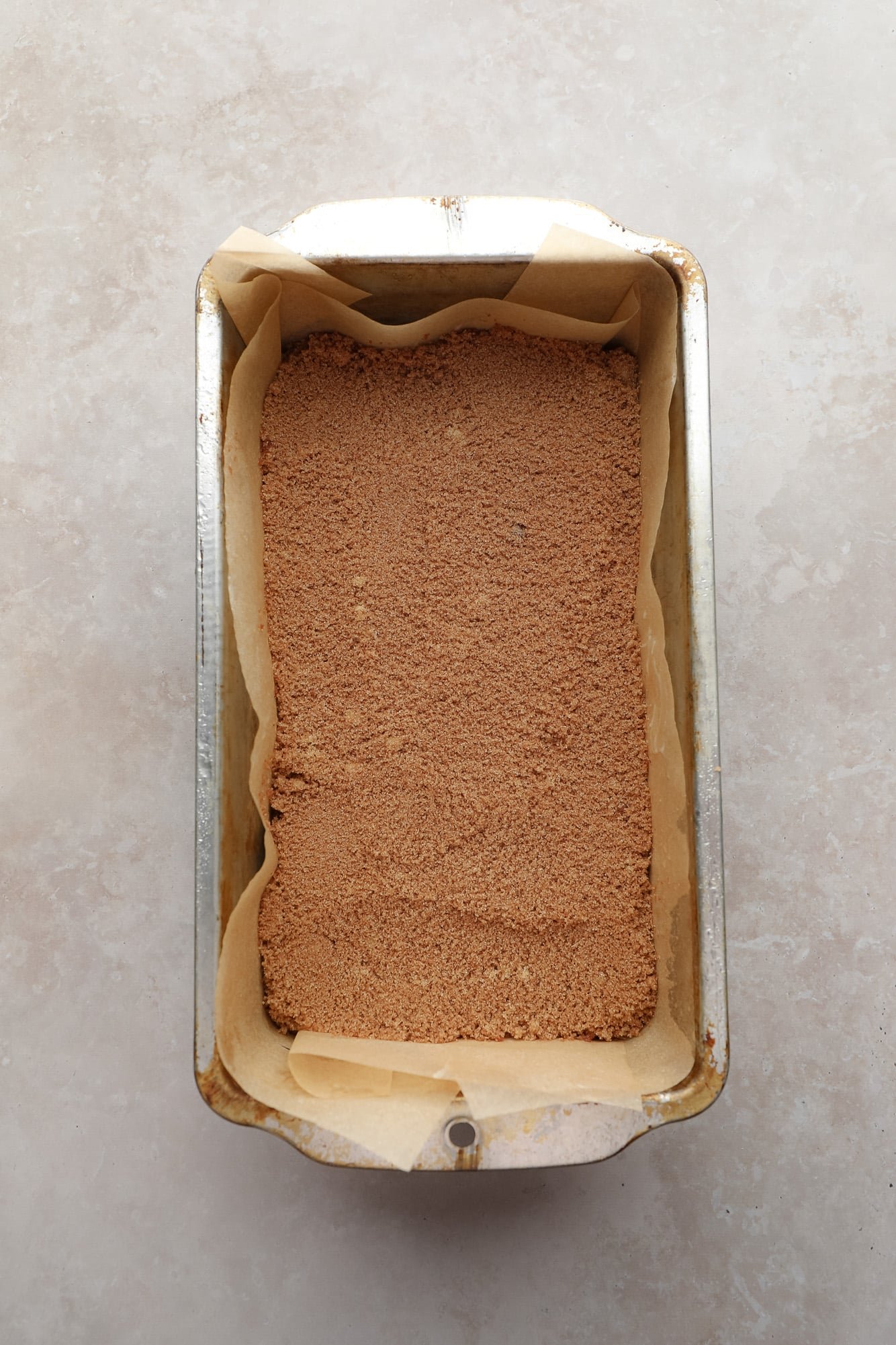 Past of fast cinnamon bread with cinnamon in a pan.