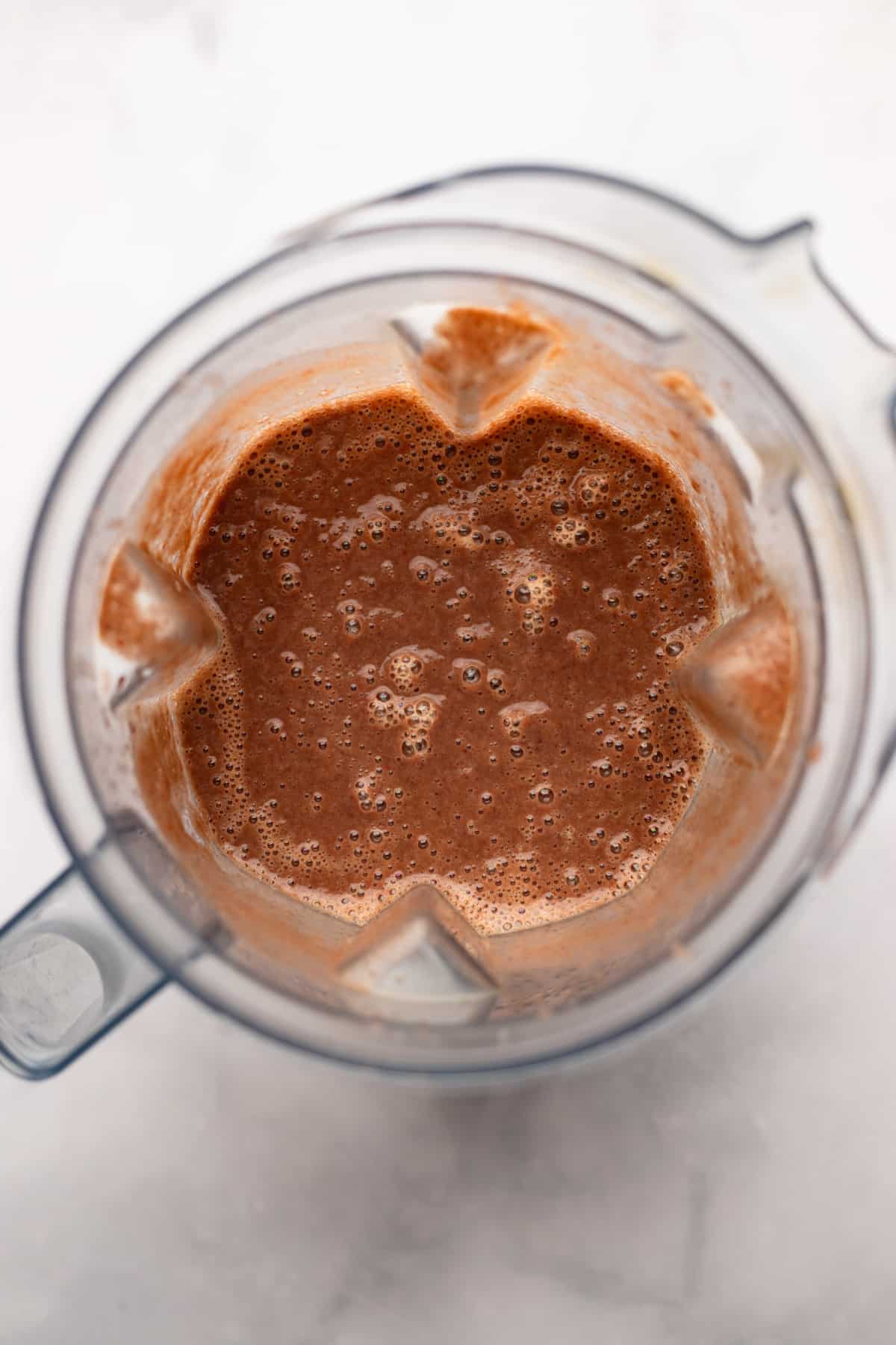 Black beans sauce in a blender.